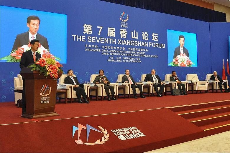 Mr Ong speaking on Tuesday at the annual Xiangshan Forum in Beijing, where he highlighted how adhering to an rules-based international system will allow all countries to prosper in the age of globalisation.