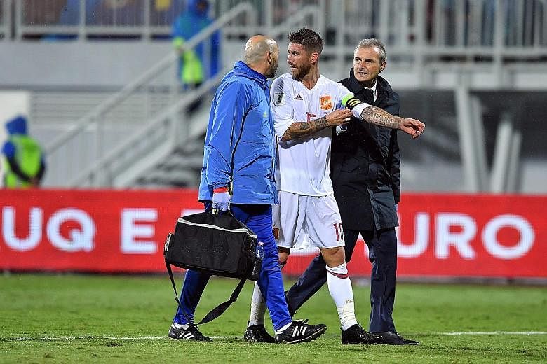 Spain's Sergio Ramos leaving the pitch after suffering a knee injury during the 2-0 win against Albania in the World Cup qualifier on Sunday. Subsequent scans have revealed the injury is more serious than first thought.