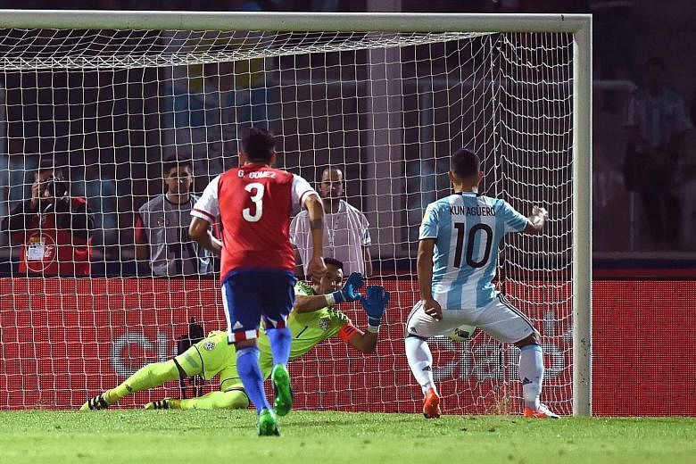 Argentina striker Sergio Aguero sees his penalty kick saved by Paraguay goalkeeper Justo Villar during their World Cup qualifier. Aguero was hoping to equalise from the spot after the visitors took the lead through Derlis Gonzalez.