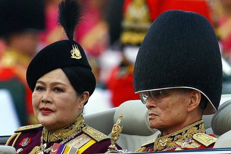 King Bhumibol Adulyadej and Queen Sirikit at celebrations in Bangkok to mark his 79th birthday in 2006. For the majority of Thais who have known only one monarch amid decades of political turbulence, the King's death represents the loss of a moral au