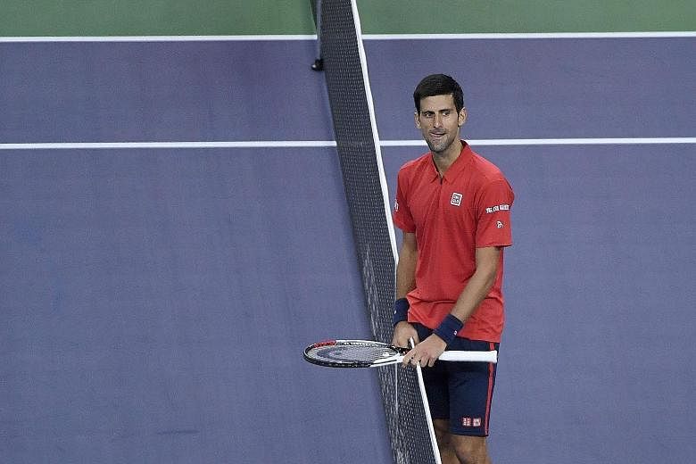 World No. 1 Novak Djokovic of Serbia (above) will face Roberto Bautista of Spain in the semi-finals of the Shanghai Masters today. Djokovic has won the tournament three times, in 2012-13 and last year.