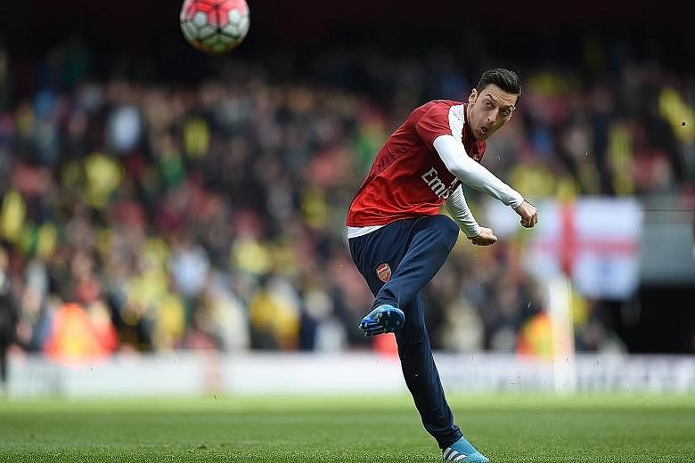 Arsenal's Mesut Ozil is in line to start against Swansea, despite appearing to pick up a slight injury while on international duty with Germany.
