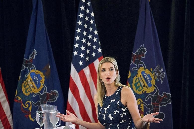 Ms Ivanka Trump answering non-challenging questions from supporters during a "coffee with Ivanka" event in Ivyland, Pennsylvania, on Thursday. She avoided mentioning accusations of groping by her father.