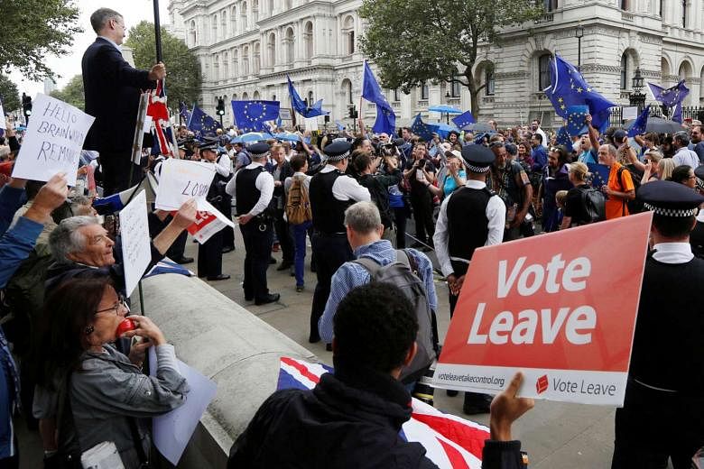 Brexit supporters forming a counter demonstration against pro-Europe demonstrators during a protest against the Brexit vote result in London last month. The writer says what the world lacks most is not more economics or politics, but a philosophy about in