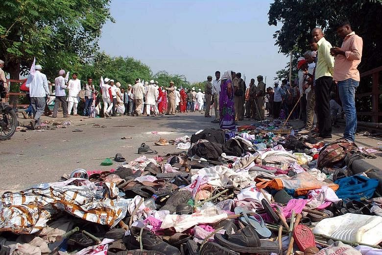 The belongings of the victims placed together near the site of the stampede. More than 100 police officers were sent to the area to control the crowd.