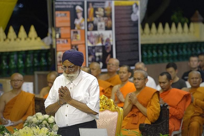 Mr Harbans Singh was one of two representatives from the Inter-Religious Organisation, Singapore, at Wat Ananda Metyarama Thai Buddhist temple in a prayer session for the late King Bhumibol. A sombre crowd, mostly dressed in black, paying their last 