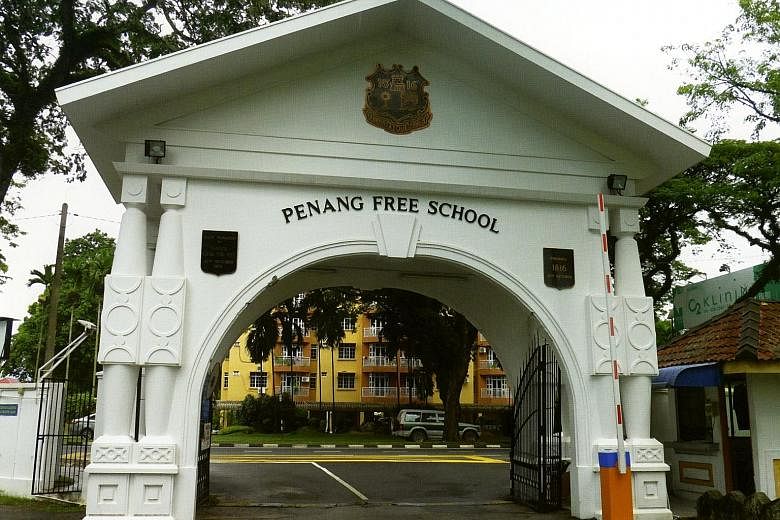 From left: The main gate and arch of the Penang Free School today. Among the school's famous and successful alumni are singer, actor and film director P. Ramlee, author and educator Catherine Lim, and Singapore's former Chief Justice Wee Chong Jin.