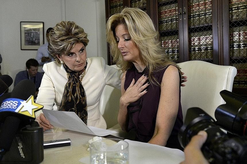 Ms Zervos (right) telling her story, with lawyer Gloria Allred beside her, at a news conference in Los Angeles on Friday. She claimed that the incident occurred at Mr Trump's bungalow suite at the Beverly Hills Hotel in 2007.