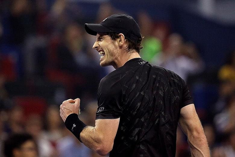 World No. 2 Andy Murray, who won the Shanghai Masters in 2010 and 2011, shows his delight at winning the title for a third time yesterday after beating world No. 19 Roberto Bautista Agut 7-6 (7-1) 6-1.