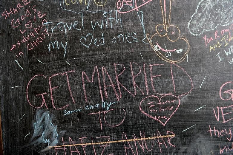 Some of the things people wrote for the Before I Die project.