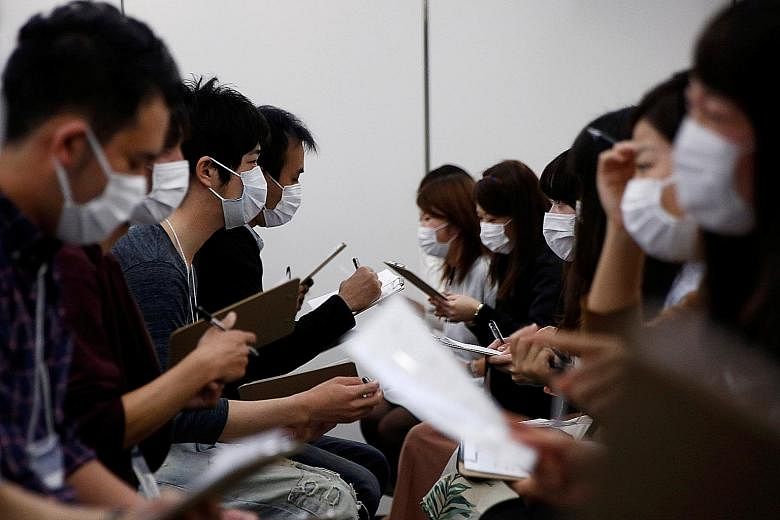 Looks are not everything. At least, that is what one Japanese dating service is trying to prove - by requiring participants in speed dating sessions to wear white surgical masks. Dating services are booming in Japan as young people brought up in the 