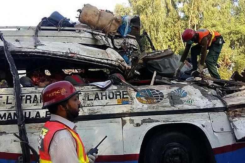 Rescue workers had to cut open the buses to extricate the bodies and injured passengers after the accident in Khanpur. The two buses, carrying about 100 passengers, collided head-on early yesterday.