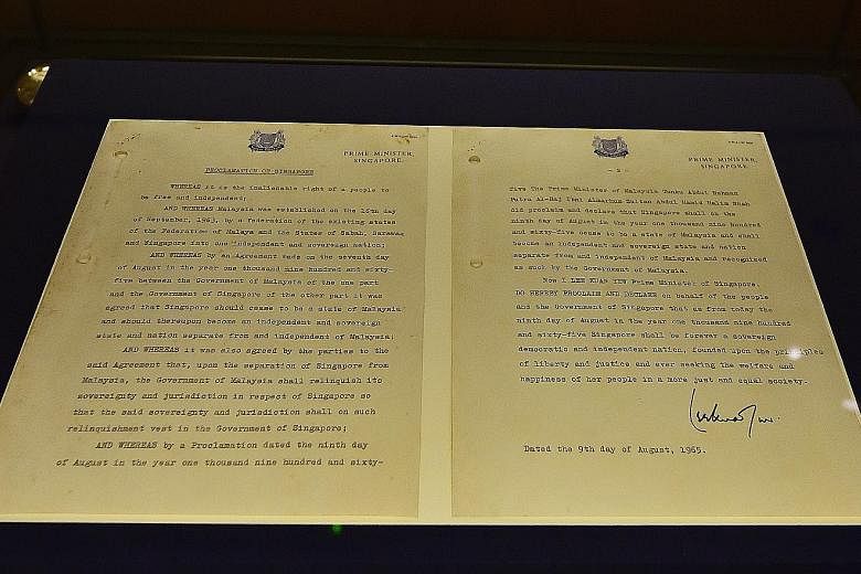 (From left) The proclamation of Singapore on Aug 9, 1965, the proclamation of Malaysia and that of Singapore joining Malaysia, both dated Sept 16, 1963.