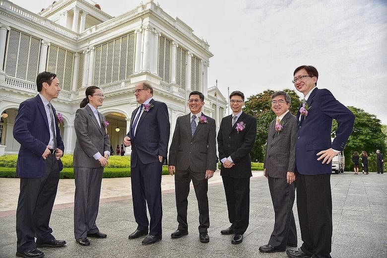 President's science and technology awards recipients (from left) Liu Xiaogang, Liu Bin, Bertil Andersson, Ong Kien Soo, Desmond Lim, Kwoh Leong Keong and Lim Wee Seng at the Istana yesterday.