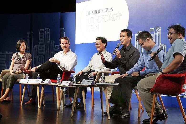 On yesterday's panel on jobs, skills and opportunities in Singapore's future were (from left) ST associate opinion editor Lydia Lim, Lee Kuan Yew Centre for Innovative Cities research fellow John Powers, Infineon technologies Asia Pacific managing di