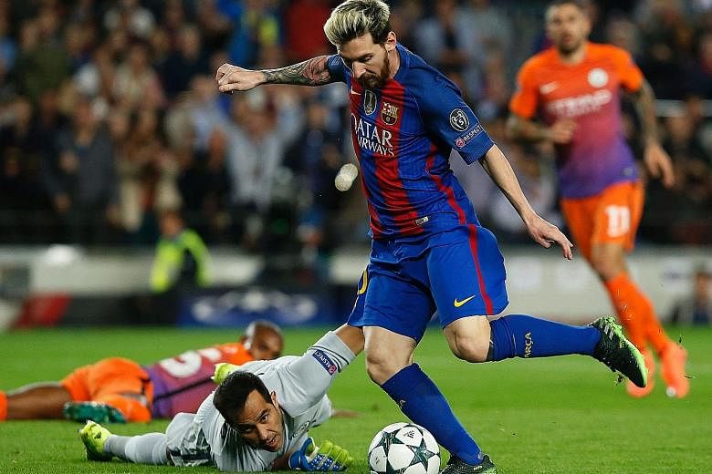 Lionel Messi, showing few effects on his return from injury, rounding City goalkeeper Claudio Bravo to open accounts for Barcelona in the 4-0 rout. Bravo blocking a shot by Luis Suarez with his hands outside the penalty area, resulting in him being s
