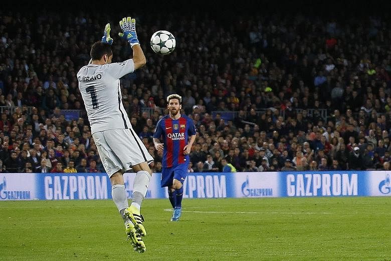 Lionel Messi, showing few effects on his return from injury, rounding City goalkeeper Claudio Bravo to open accounts for Barcelona in the 4-0 rout. Bravo blocking a shot by Luis Suarez with his hands outside the penalty area, resulting in him being s