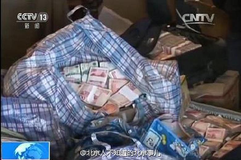 Wei Pengyuan in court during his corruption trial, and some of the cash found stashed in his Beijing apartment, as shown on state television.