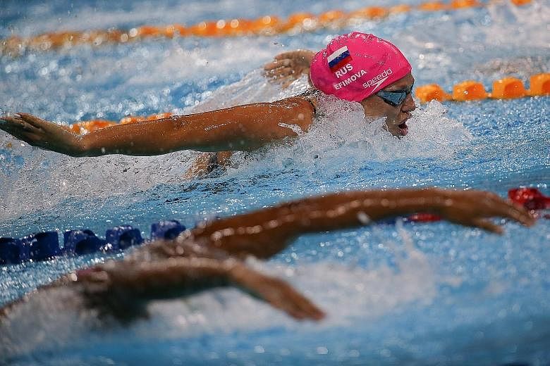 Russia's Yulia Efimova competing in the 200m individual medley. She was third behind two Hungarians, winner Katinka Hosszu and Zsuzsanna Jakabos.