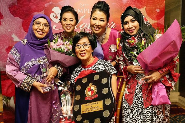 Finalists for this year's Exemplary Mother Award are (from left) Dr Alimah Lob, 70, a teacher; Madam Tan Siew Suan, 61, self-employed; Madam Ling Bee Sian, 63, a nursing home director; Madam Betty Yu, 54, an image consultant; and Madam Norhaiyati Yus