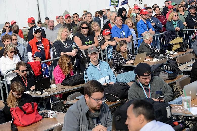 Trump supporters surrounding the media pen at a rally in New Hampshire this month. In seeking to explain Mr Trump's appeal, proportionate media coverage would require more stories about the racism and misogyny among white Trump supporters in tony sub