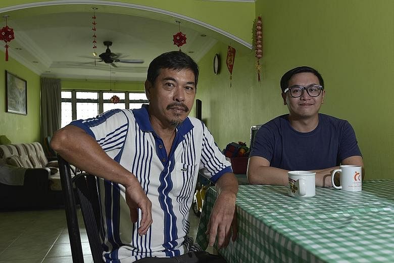 Mr Soh Chun Wee (right) is proud that his father, Mr Soh Chin Soon's (left) Western food stall has helped to put him and his younger brother through university.