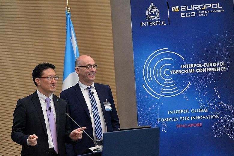 Mr Nakatani and Mr Wilson opening the Fourth Interpol-Europol Cybercrime Conference, held at the Interpol Global Complex for Innovation last month.