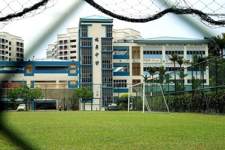 Students from Woodgrove Secondary (above) and Ahmad Ibrahim Secondary took the wrong O-level maths paper after the schools mixed up the syllabus codes for the subject during registration.