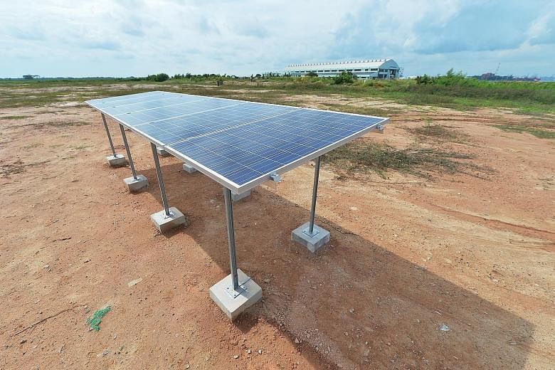 Solar panels installed on Semakau Landfill for the Reids system, which will have four microgrids, each with its own composition of energy sources: sun, wind, sea, diesel, storage and power-to-gas technologies.