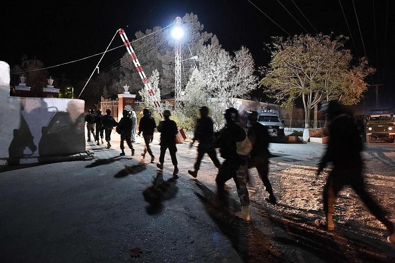 Pakistani soldiers arriving at the Balochistan Police College in Quetta on Monday, after it was attacked by three gunmen.