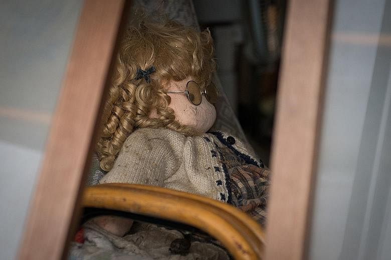 A doll inside an abandoned house in Namie, one of the many communities in Japan's Fukushima prefecture devastated by the magnitude-9.0 earthquake and tsunami in March 2011.