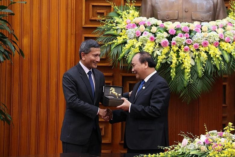 Minister for Foreign Affairs Vivian Balakrishnan has reaffirmed bilateral relations between Singapore and Vietnam during a meeting with Prime Minister Nguyen Xuan Phuc in Hanoi, Singapore's Ministry of Foreign Affairs said in a statement yesterday. D