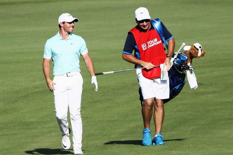 Golf Rory McIlroy's caddy is US1m richer after taking 10 of golfer's