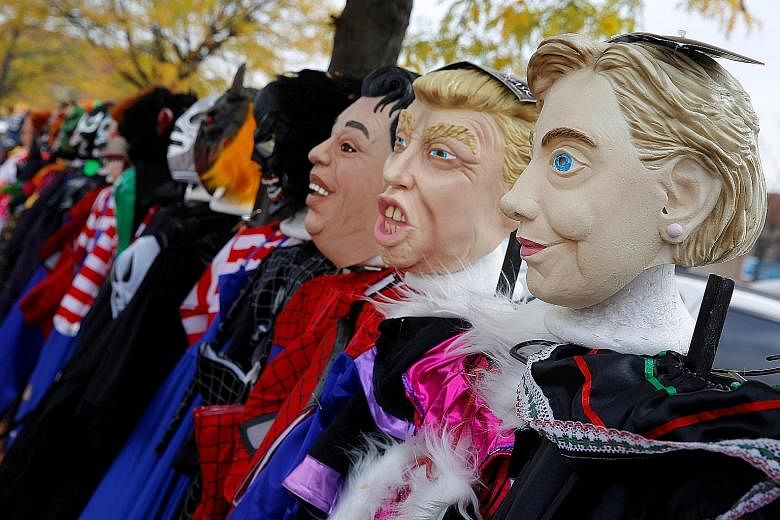 Halloween masks depicting candidates Hillary Clinton and Donald Trump for sale in Chicago. With the campaign in its last 10 days, there are still uncertainties as to what will happen after the election.