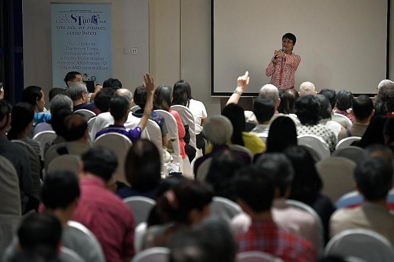 Straits Times senior health correspondent Salma Khalik taking questions from the audience at a free askST talk held at the library@orchard yesterday. Over 200 people registered for the event.