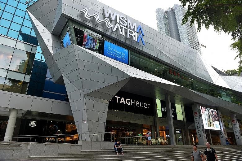Starhill Global Reit's Singapore portfolio, comprising interests in Wisma Atria (left) and Ngee Ann City in Orchard Road, contributed 63.4 per cent of total quarterly revenue, or $35 million.