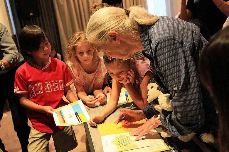 Dr Goodall meeting children during her visit to Malaysia. She has spent the past few years travelling to meet youngsters worldwide under her youth advocacy programme, raising awareness about conservation.