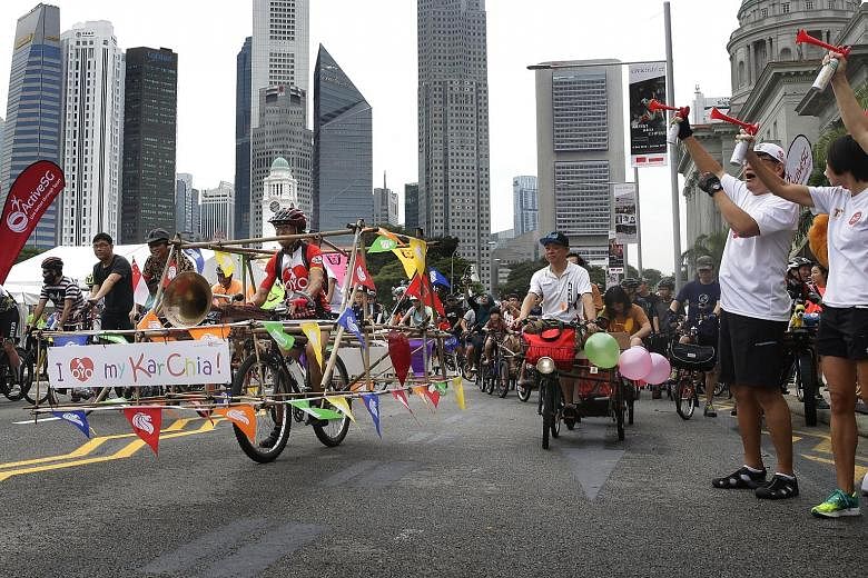 A cyclist and his bamboo-inspired bicycle joining other cycling enthusiasts at the flag-off yesterday for Car-Free Sunday, in front of the National Gallery Singapore. It was the first Car-Free Sunday after a three-month hiatus. The programme now cove