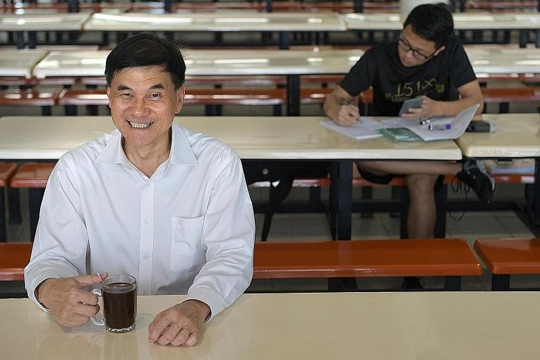 Nanyang Junior College principal Kwek Hiok Chuang is known for talking to students in the canteen during their break, with a glass of coffee in his hand. He believes that when students like the school, they are prepared to do more. Former students ha