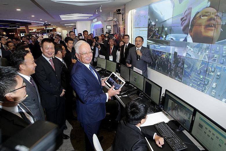 Mr Najib at the launch of Huawei's Customer Solution Integration and Innovation Experience Centre in Kuala Lumpur last week. Huawei was recently appointed adviser to the Malaysian government on information and communication technology projects, said 