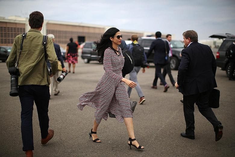 Ms Abedin photographed at Ronald Reagan Washington National Airport in September. She has worked with Mrs Clinton since 1996 when she was assigned to the Office of the First Lady at the White House as an intern. She was widely expected to take on a s