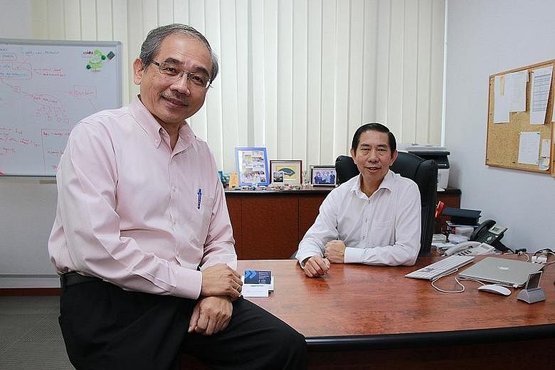 Mr Chiang (right) and Mr Kuek head Whizcomms, the new kid on the block for fibre broadband.