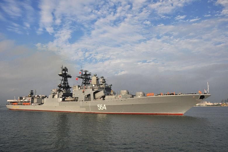 Russian destroyer Admiral Tributs arriving at Zhanjiang in China's southern Guangdong province in September. The current tensions in the South China Sea will be a major challenge for the next US president.