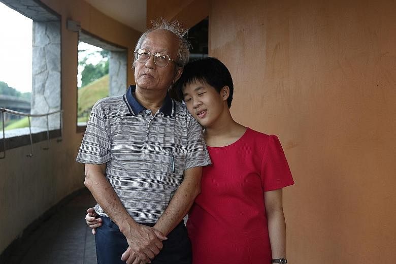 Mr Chong's daughter Wan Shuen has a mild intellectual disability, but through the school-to-work transition programme, she has found work at the linen department of the National University Hospital.