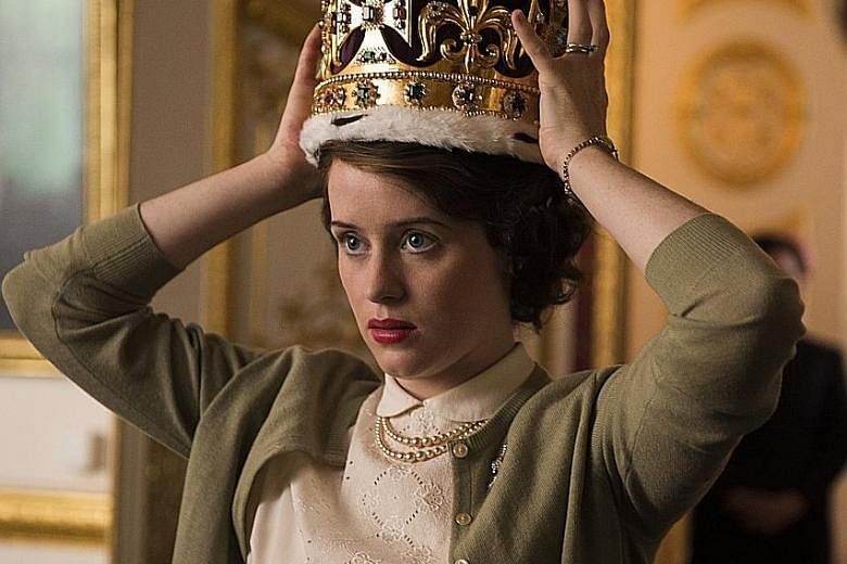 Queen Elizabeth II (played by Claire Foy, left) is made queen at the age of 25 after her father, King George VI, dies of lung cancer.
