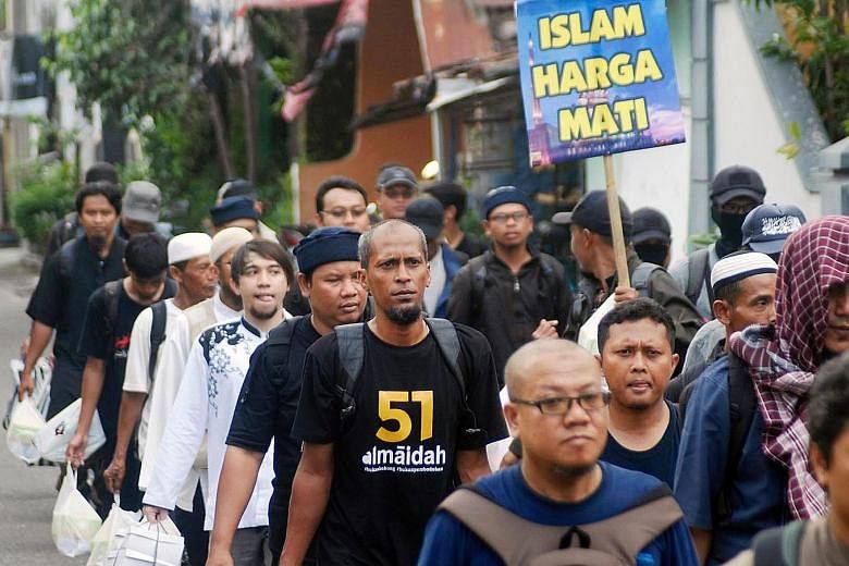 Security has been tightened in Jakarta ahead of the protest against Governor Basuki, who faces allegations of blasphemy. More than 20,000 policemen and soldiers have been mobilised.