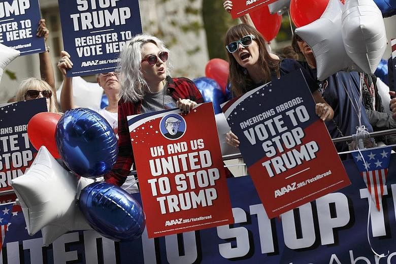 Anti-Trump campaigners at a September rally in London to urge Americans abroad to register and vote. Most European governments are psychologically incapable of thinking of, let alone planning for, a Trump presidency.