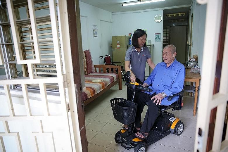 Mr Goh appreciates the help he gets from occupational therapist Doreen Ang, saying she is like family to him.