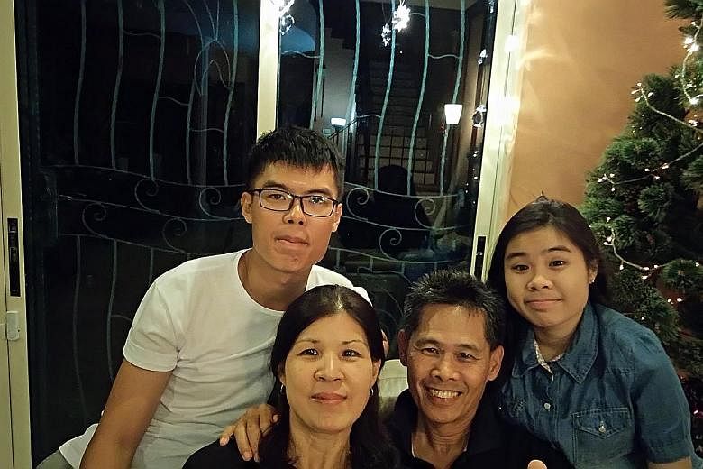 Mr Ho with his wife Susan, son Jonathan and younger daughter Christabel. He enjoys staying abreast of events that affect Singapore and the environment.
