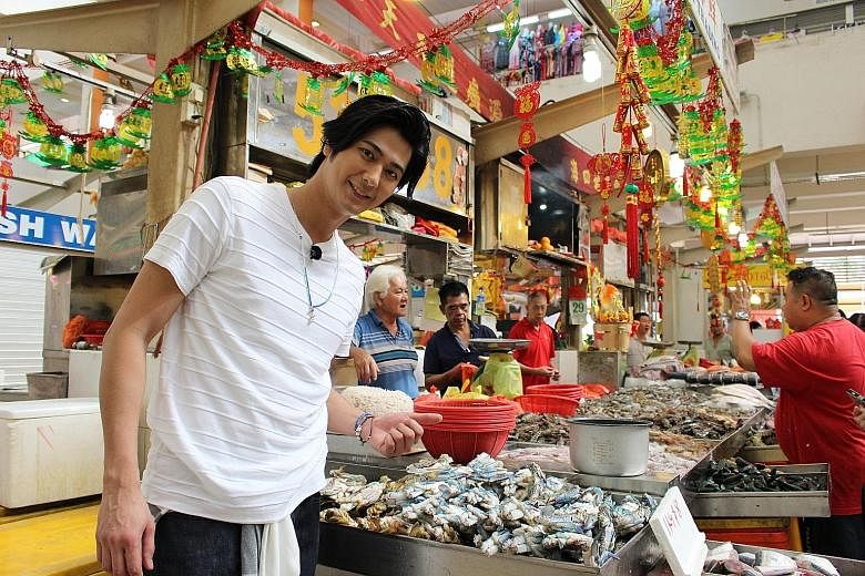 Japanese actor-host Mokomichi Hayami checking out the wet market at Tekka Centre during his visit to Singapore to film his popular cooking show, Moco's Kitchen.
